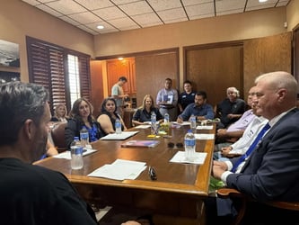 Local leaders, farmers and Project Food Box employees gather for a roundtable discussion with Rep. Raul Ruiz at Sunterra Produce in Brawley on Monday, Aug. 4